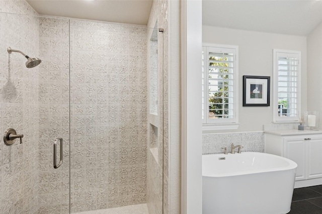 8229 Halifax, The Colony, TX 75056 - full bath with a shower stall, tile patterned floors, a freestanding bath, and vanity