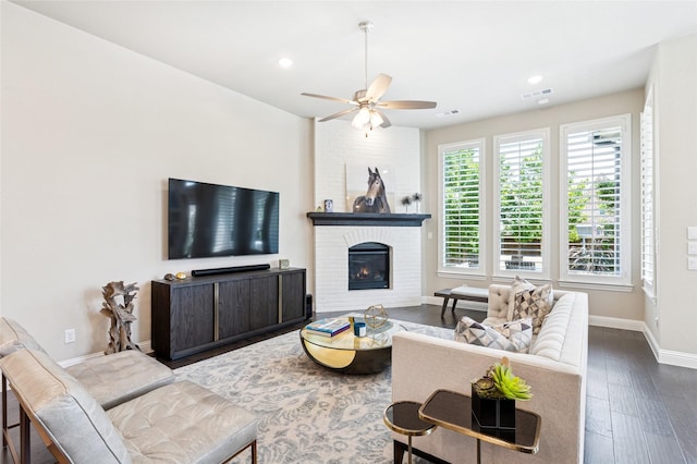 8229 Halifax, The Colony, TX 75056 - living area featuring baseboards, a ceiling fan, a fireplace, wood finished floors, and recessed lighting
