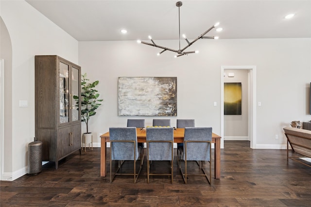 8229 Halifax, The Colony, TX 75056 - dining room with a chandelier, dark wood-type flooring, baseboards, arched walkways, and recessed lighting