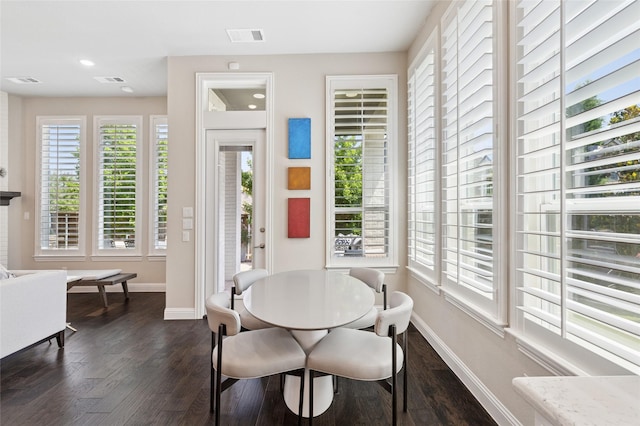 8229 Halifax, The Colony, TX 75056 - dining space with baseboards, plenty of natural light, dark wood-style flooring, and recessed lighting