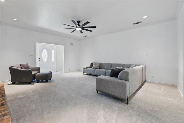 201 Wilson St, Whitesboro, TX 76273 - carpeted living area with a ceiling fan, baseboards, ornamental molding, and recessed lighting