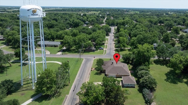 201 Wilson St, Whitesboro, TX 76273 - bird's eye view of a heavily wooded area
