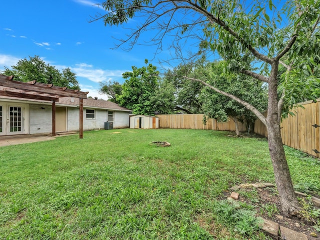 13439 Challaburton, Farmers Branch, TX 75234 - view of yard with french doors, a pergola, and central AC