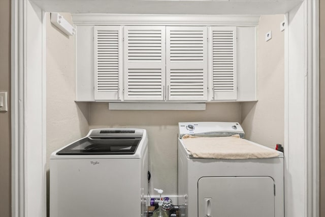 3200 Haltom Rd, Haltom City, TX 76117 - washroom with washing machine and dryer and cabinet space