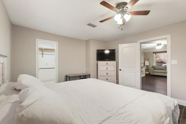 3200 Haltom Rd, Haltom City, TX 76117 - bedroom with dark wood finished floors, baseboards, and a ceiling fan