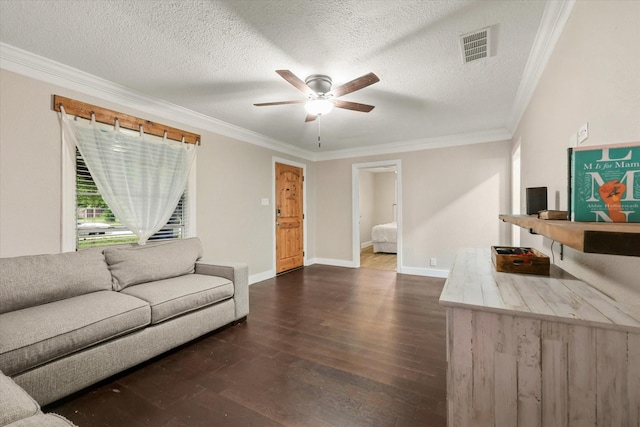 3200 Haltom Rd, Haltom City, TX 76117 - living area with a ceiling fan, dark wood finished floors, crown molding, baseboards, and a textured ceiling
