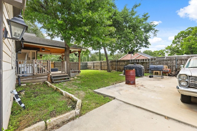3200 Haltom Rd, Haltom City, TX 76117 - view of yard with a ceiling fan, a patio area, and a wooden deck