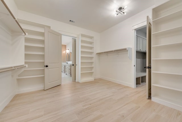 160 Maci Dr, Waxahachie, TX 75167 - spacious closet featuring light wood-style floors