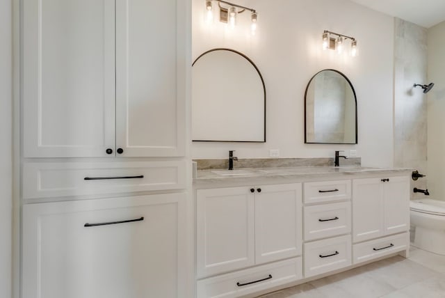 160 Maci Dr, Waxahachie, TX 75167 - bathroom with double vanity, toilet, and tile patterned flooring