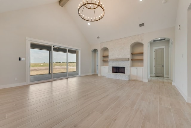160 Maci Dr, Waxahachie, TX 75167 - unfurnished living room featuring high vaulted ceiling, baseboards, a chandelier, light wood-style flooring, and beam ceiling