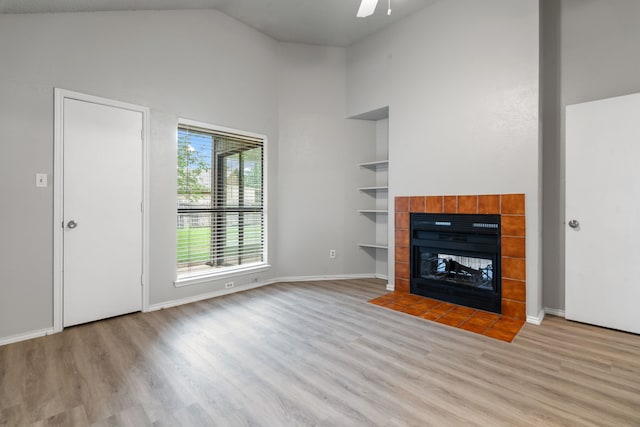 2526 Butterfield Dr, Fort Worth, TX 76133 - unfurnished living room featuring high vaulted ceiling, light wood-type flooring, ceiling fan, and baseboards