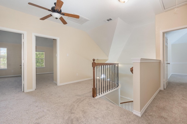 3010 Partridge Ln, Mckinney, TX 75072 - corridor featuring an upstairs landing, carpet flooring, attic access, lofted ceiling, and baseboards