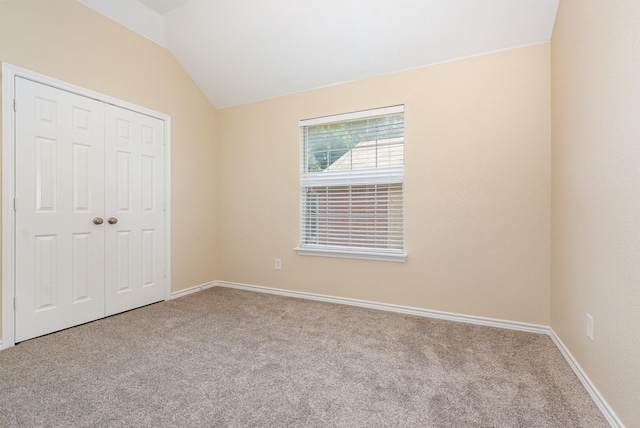 3010 Partridge Ln, Mckinney, TX 75072 - unfurnished bedroom with carpet flooring, lofted ceiling, a closet, and baseboards