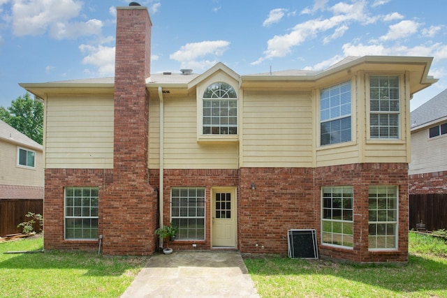 3010 Partridge Ln, Mckinney, TX 75072 - rear view of property with brick siding, a chimney, and a patio