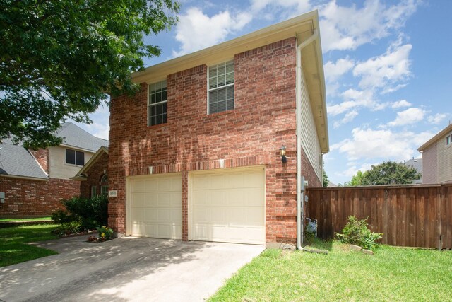 3010 Partridge Ln, Mckinney, TX 75072 - view of front of house featuring an attached garage, brick siding, and concrete driveway