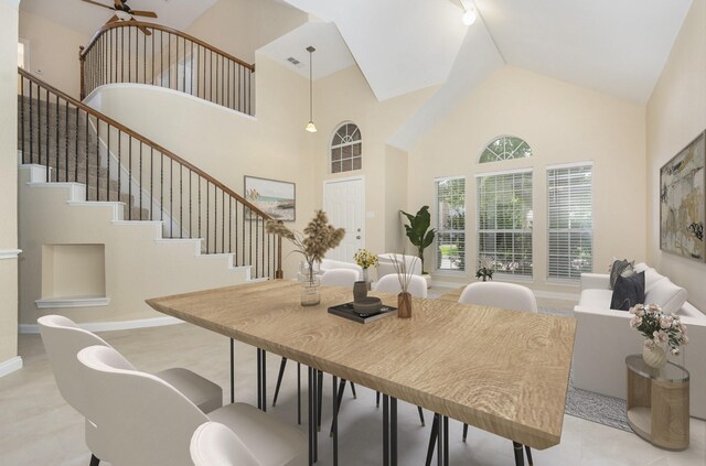 3010 Partridge Ln, Mckinney, TX 75072 - dining space with high vaulted ceiling, stairway, and a ceiling fan
