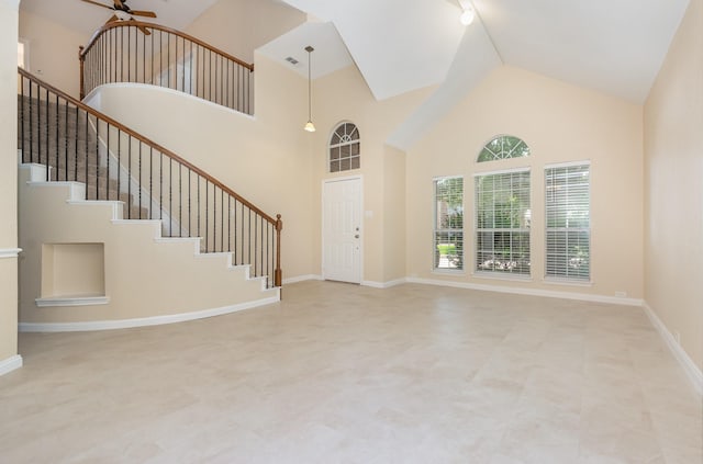 3010 Partridge Ln, Mckinney, TX 75072 - entryway featuring high vaulted ceiling, stairway, ceiling fan, and baseboards