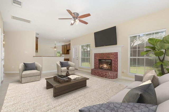 3010 Partridge Ln, Mckinney, TX 75072 - living area featuring a ceiling fan, a brick fireplace, and light carpet