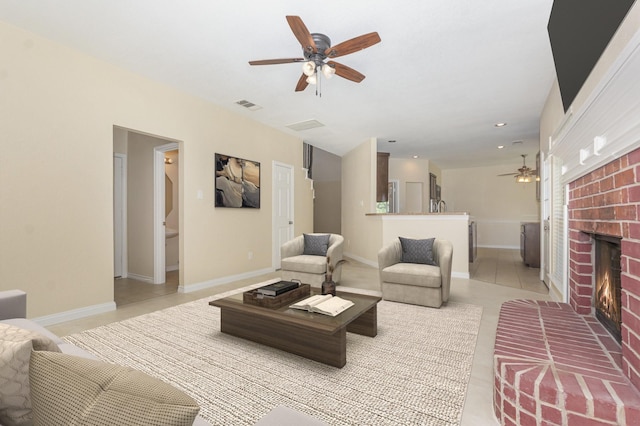 3010 Partridge Ln, Mckinney, TX 75072 - living room with ceiling fan, light tile patterned flooring, a brick fireplace, and recessed lighting