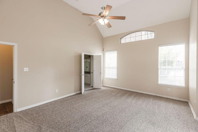 1823 Bristol Ln, Rockwall, TX 75032 - unfurnished bedroom with high vaulted ceiling, carpet floors, multiple windows, baseboards, and ceiling fan