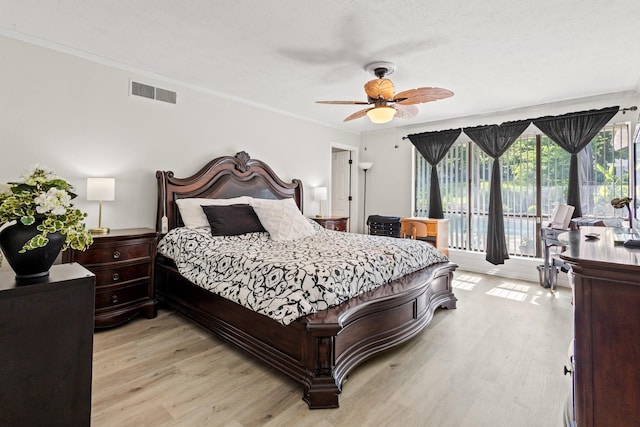 1407 S Alamo Rd, Rockwall, TX 75087 - bedroom featuring light wood-style flooring, ornamental molding, a ceiling fan, and access to outside