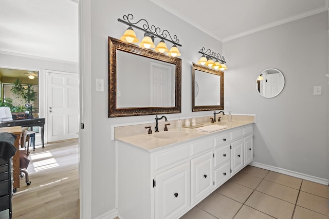 1407 S Alamo Rd, Rockwall, TX 75087 - bathroom featuring ornamental molding, double vanity, baseboards, and tile patterned flooring