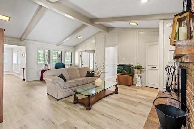 1407 S Alamo Rd, Rockwall, TX 75087 - living area with a decorative wall, light wood-type flooring, a fireplace, and recessed lighting