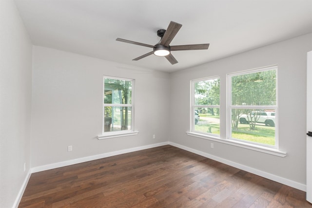 1024 Tower St, Canton, TX 75103 - empty room featuring dark wood-type flooring, ceiling fan, and baseboards
