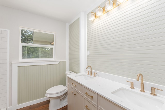 1024 Tower St, Canton, TX 75103 - bathroom with toilet, wood finished floors, and double vanity