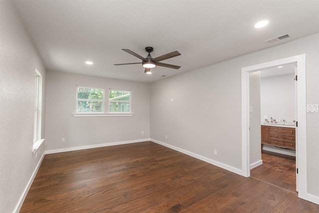 1024 Tower St, Canton, TX 75103 - spare room with ceiling fan, dark wood-style floors, recessed lighting, and baseboards
