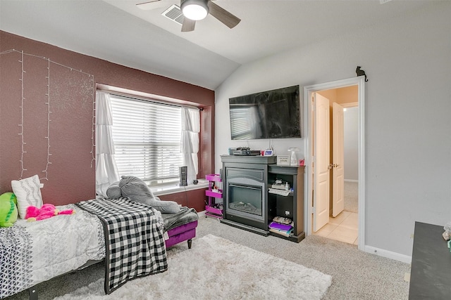 1112 Goldenrod Dr, Godley, TX 76044 - carpeted bedroom featuring vaulted ceiling and ceiling fan