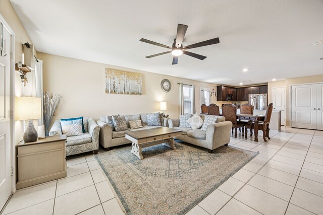 3350 Margay Run, Crandall, TX 75114 - living area featuring a ceiling fan, light tile patterned floors, and recessed lighting