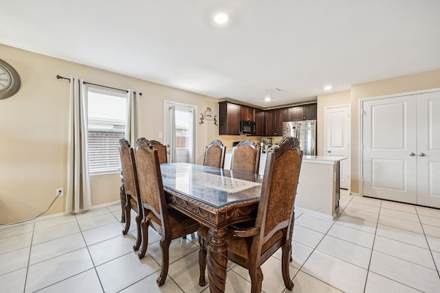 3350 Margay Run, Crandall, TX 75114 - dining space with light tile patterned flooring, baseboards, and recessed lighting