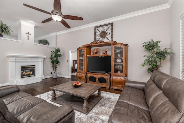 24 Shady Dale Ln, Rockwall, TX 75032 - living area featuring ceiling fan, crown molding, wood finished floors, a brick fireplace, and baseboards