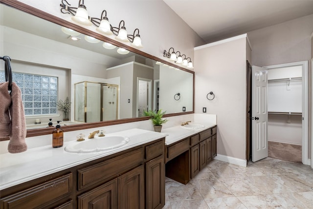 24 Shady Dale Ln, Rockwall, TX 75032 - full bathroom featuring a shower stall, double vanity, a spacious closet, and baseboards