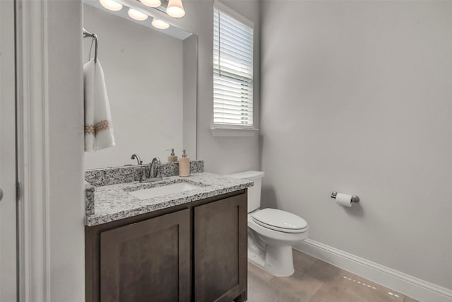 2309 Normandy Ave, Anna, TX 75409 - bathroom with vanity, toilet, and baseboards