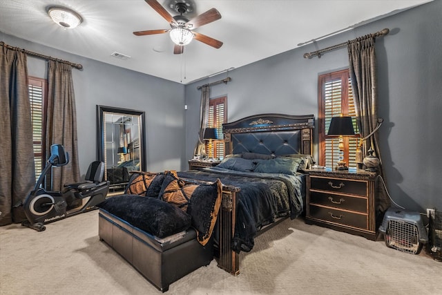 6500 Lazy Oak Ln, Plano, TX 75024 - bedroom featuring light colored carpet, multiple windows, and a ceiling fan