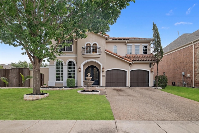 6500 Lazy Oak Ln, Plano, TX 75024 - mediterranean / spanish-style house with a balcony, concrete driveway, a tile roof, stucco siding, and a garage