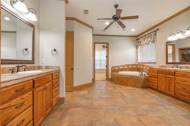 2454 Savanna Cir, Midlothian, TX 76065 - bathroom with ceiling fan, two vanities, a garden tub, baseboards, and crown molding