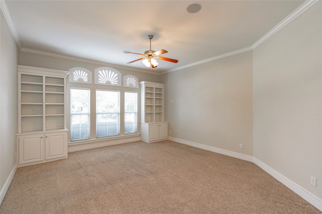 2454 Savanna Cir, Midlothian, TX 76065 - spare room with light carpet, a ceiling fan, ornamental molding, and baseboards