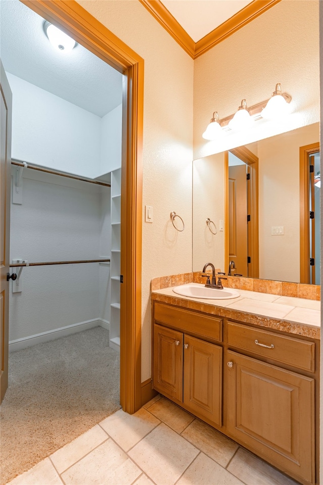 2454 Savanna Cir, Midlothian, TX 76065 - bathroom featuring vanity, tile patterned flooring, and ornamental molding