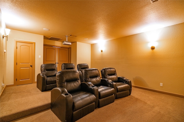 2454 Savanna Cir, Midlothian, TX 76065 - cinema room featuring carpet, a textured ceiling, baseboards, and a textured wall
