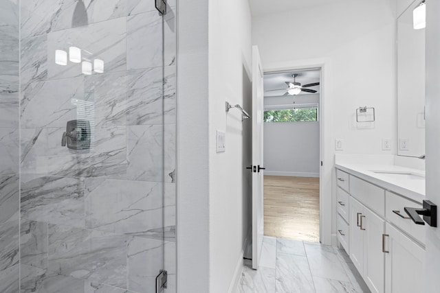 4133 Emerson Ave Unit 1, University Park, TX 75205 - full bath with a marble finish shower, vanity, baseboards, and a ceiling fan