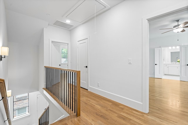4133 Emerson Ave Unit 1, University Park, TX 75205 - hallway featuring attic access, an upstairs landing, light wood-type flooring, recessed lighting, and baseboards