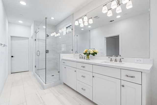 4133 Emerson Ave Unit 1, University Park, TX 75205 - bathroom featuring double vanity, a stall shower, and recessed lighting