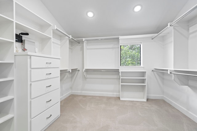 4133 Emerson Ave Unit 1, University Park, TX 75205 - walk in closet with light carpet and lofted ceiling