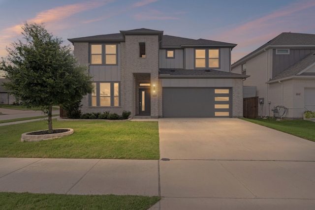 10650 Barrington Ln, Fort Worth, TX 76126 - view of front of house with driveway, a front yard, an attached garage, board and batten siding, and brick siding