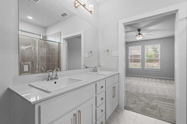 10650 Barrington Ln, Fort Worth, TX 76126 - full bath with double vanity, a ceiling fan, tiled shower, marble look tile flooring, and recessed lighting