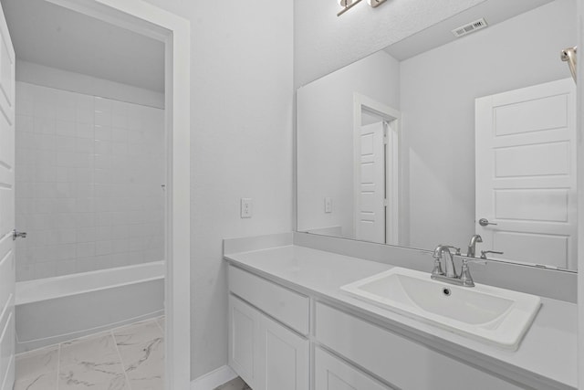 10650 Barrington Ln, Fort Worth, TX 76126 - full bath featuring marble finish flooring, vanity, and  shower combination