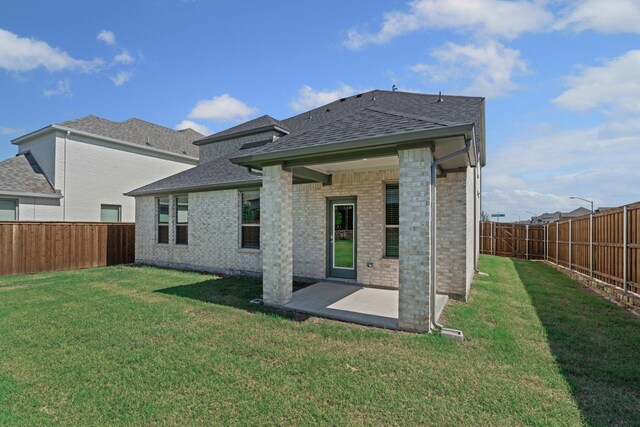10650 Barrington Ln, Fort Worth, TX 76126 - rear view of property with roof with shingles, a fenced backyard, a patio area, and brick siding